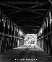 Bennett's Mill covered bridge in South Shore, Ky., June 1976 black & white photograph.