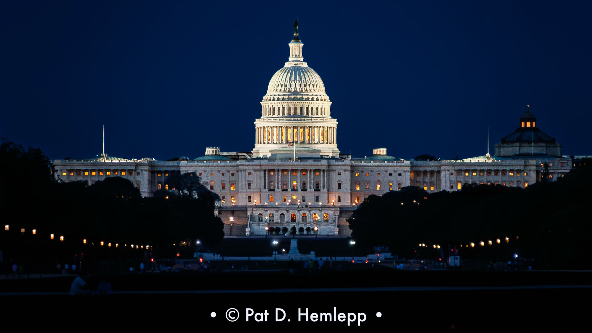 The U.S. Capitol Building at night as seen from The National Mall, Washington, D.C.