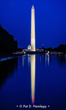 The Washington Monument mirrored in the Reflecting Pool after sunset, Washington, D.C.