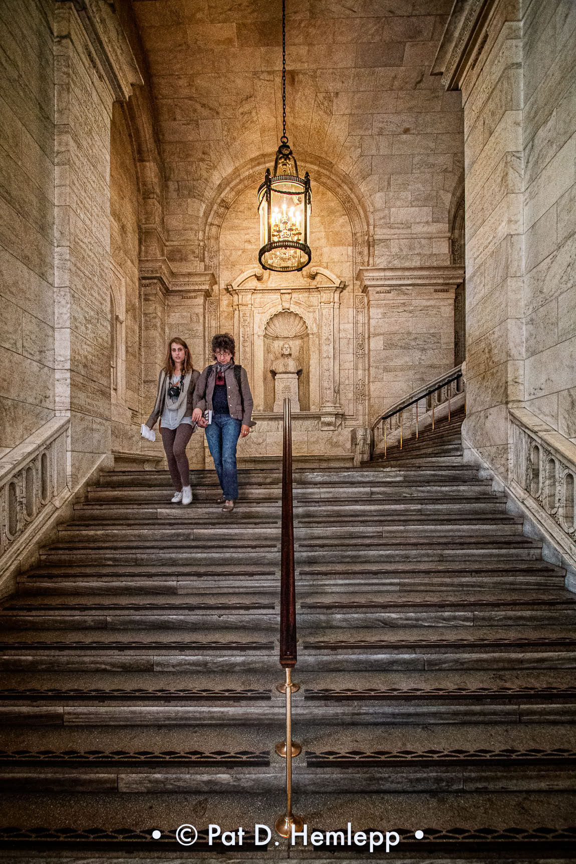 Walking down stairs in New York Public Library, New York City.