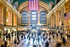 Travelers rush through the Main Concourse of Grand Central Terminal, New York City.