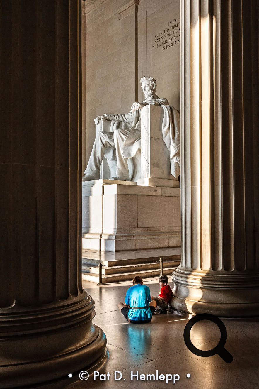 Visitors spend a quiet moment at the Lincoln Memorial, Washington, D.C.