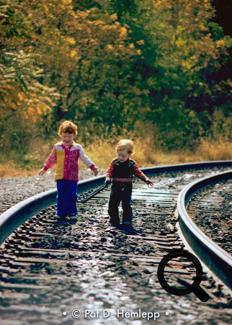 My niece and nephew on railroad tracks near Russell, Ky., October 1978.