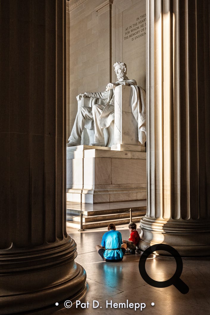 Visitors spend a quiet moment at the Lincoln Memorial, Washington, D.C.